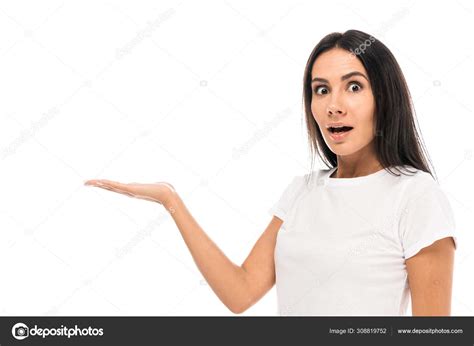 Beautiful Surprised Woman Pointing Hand While Looking Camera Isolated
