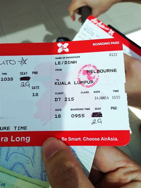 Your boarding pass is invalid until it is stamped as proof of validation. Getting Premium on Air Asia. - Fly with Dinh.