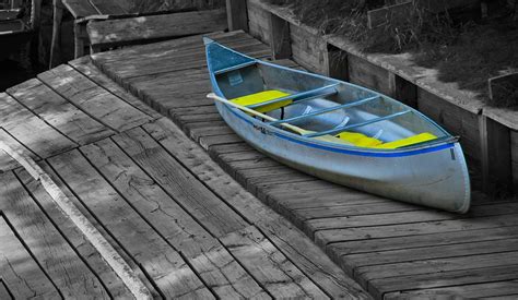 Colorful Canoe On The Dock Photograph By Dan Sproul