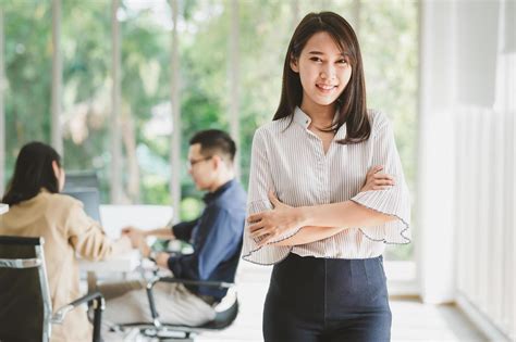 Asian Business Woman In Office 1392142 Stock Photo At Vecteezy