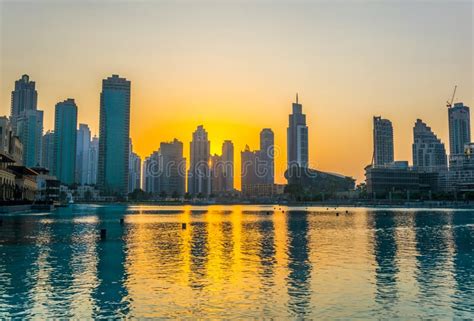 Sunset Over The Burj Khalifa Lake In Dubai Uaeimage Stock Photo