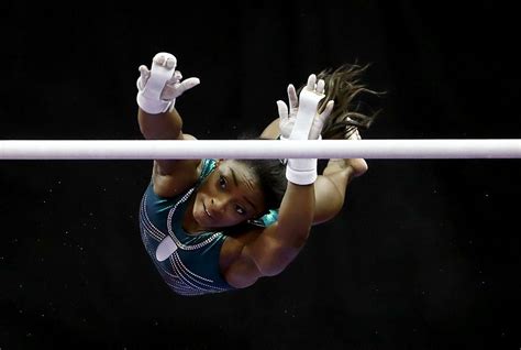 Simone biles | jamie squire/getty images. How Tall Is Simone Biles, and What Is the Gymnast's Net Worth in 2019?