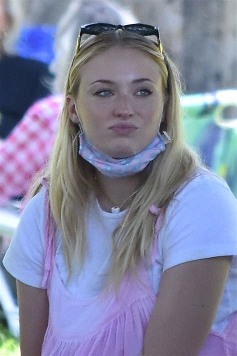 At least that's what it appears she's trying to tell the world. Pregnant SOPHIE TURNER at a Picnic in Studio City 07/06 ...