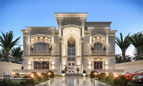 A Large White Building With Lots Of Windows And Lights On Its Front