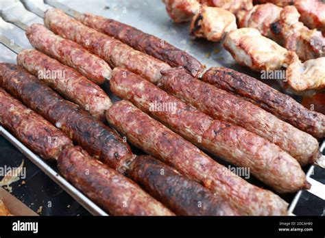 Cooked Sausages On Skewers On The Street Stock Photo Alamy