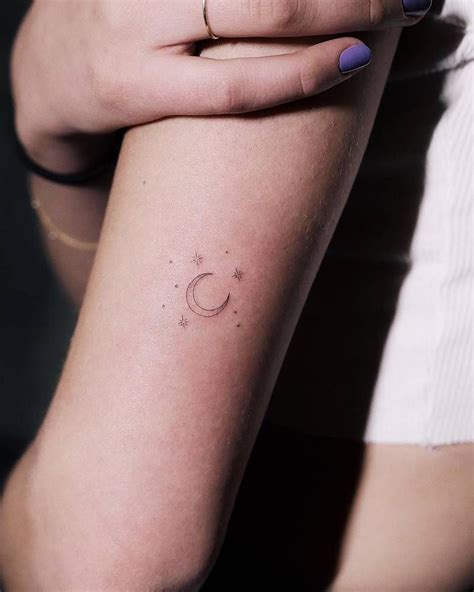 Single Needle Crescent Moon Tattoo On The Back Of The Small Moon