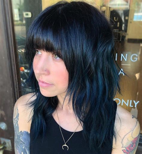 Blue Black Shag With Arched Bangs Blue Black Hair Color Cool Hair