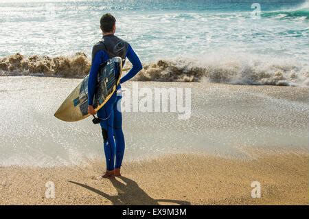 Naked Surfing Nude Surfer On Wave Cornwall Uk Stock Photo Alamy