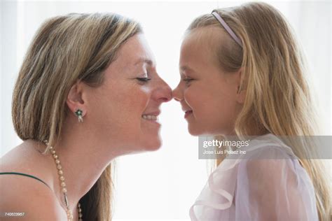 Caucasian Mother And Daughter Rubbing Noses Photo Getty Images
