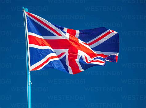 British Flag Waving Against Clear Sky Stock Photo