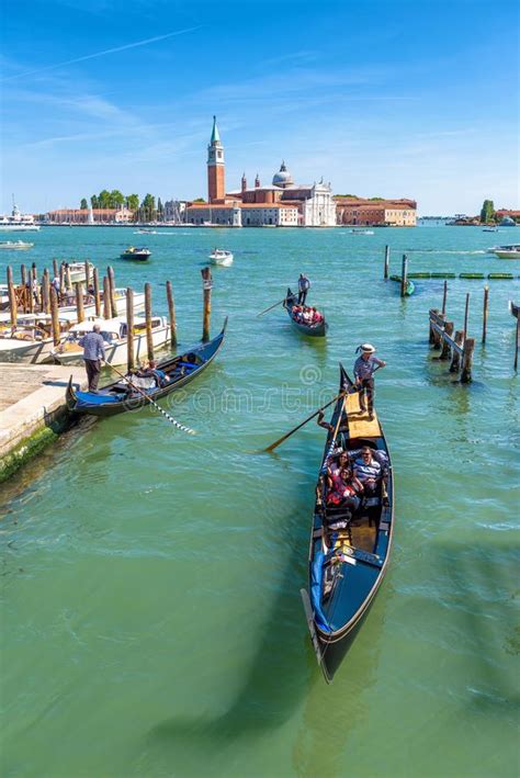 Gondolas With Tourists Are Sailing In Venice Editorial Stock Image