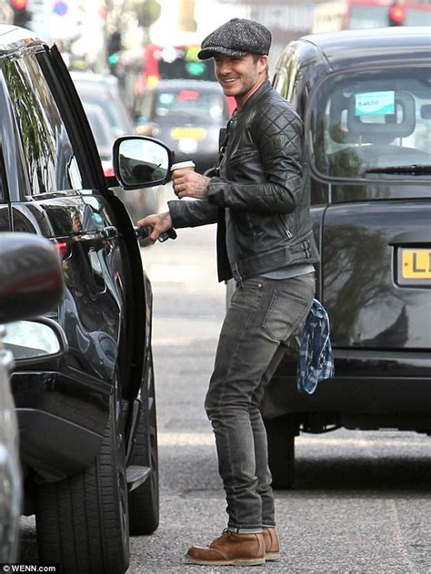 David robert joseph beckham is a former english professional football player. David Beckham accessorises his jeans with a scarf in the ...