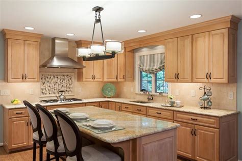 Contemporary Kitchen With Light Colored Wood Cabinets And Kitchen