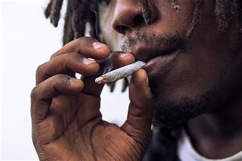 Man Smoking Weed Stock Photos Pictures And Royalty Free Images Istock