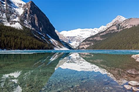 Snowy Mountain Reflection On Lake Louise Banff Alberta Canada