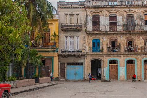 Street Scene With Classic Old Cars And Traditional Colorful Buildings In Downtown Havana Cuba