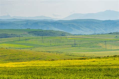 Scenic View Of Green Fields And Meadows And Mountains Of Armenia