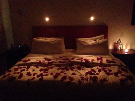 Ok, we're just going to say it: Rose Petals On Bed With Candles | Romantic room, Romantic ...