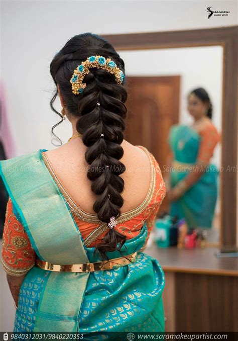 Keep your hair up and away from your face by teasing strands at the root and pulling. Hair do | Indian bridal hairstyles, Indian wedding ...