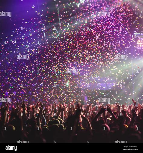 A Crowded Concert Hall With Scene Stage Lights Rock Show Performance