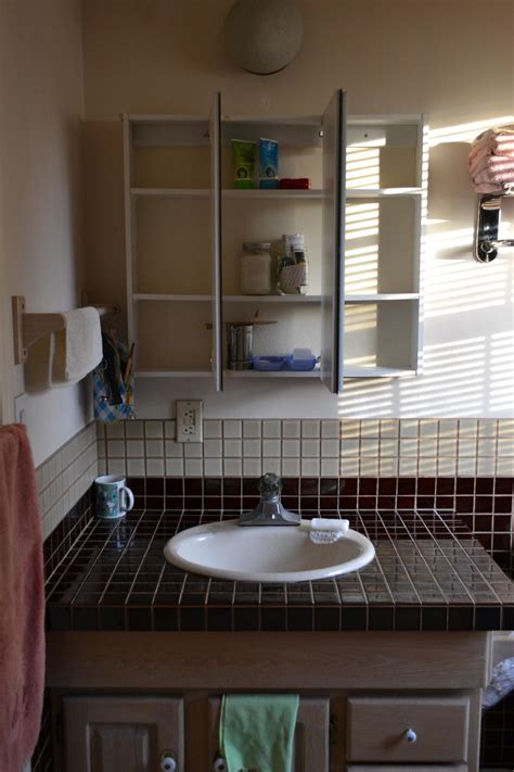 Mug trees & mug hooks. Minimal Bathroom Countertop & Medicine Cabinet : minimalism