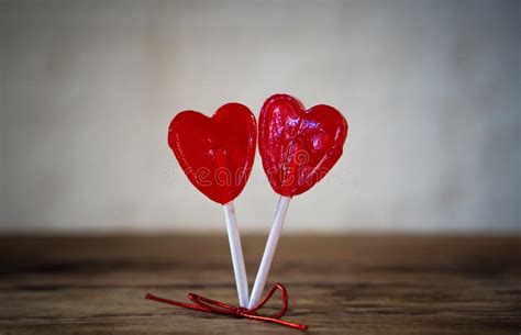 Two Red Heart Shaped Lollipops As Metaphor Of Love Togetherness And