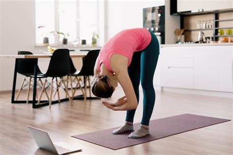 Free Photo Caucasian Woman Practicing Yoga At Home