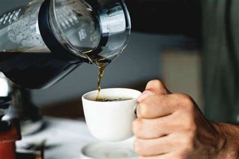 Man Pouring Coffee Into Cup Positive Routines
