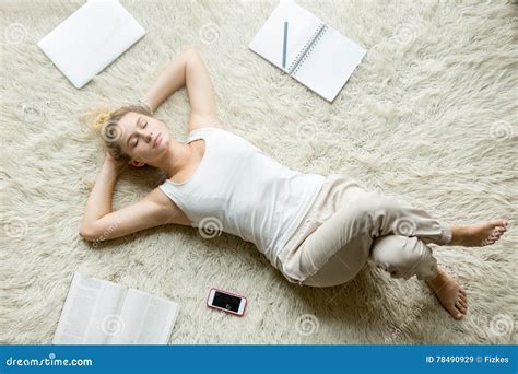 Teenage Girl Relaxing On The Floor Of Living Room Stock Image Image