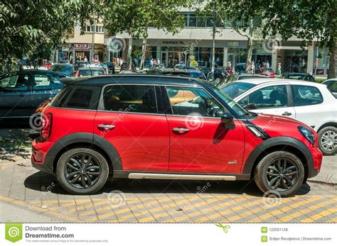 Red With Black Roof Mini Cooper Countryman S Car Parked On The Parking