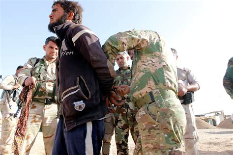 Pictures Show Isis Militants Captured By Peshmerga Forces Al Arabiya English