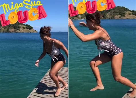 Juliana Paes posa estrela do mar e curte feriado a família em