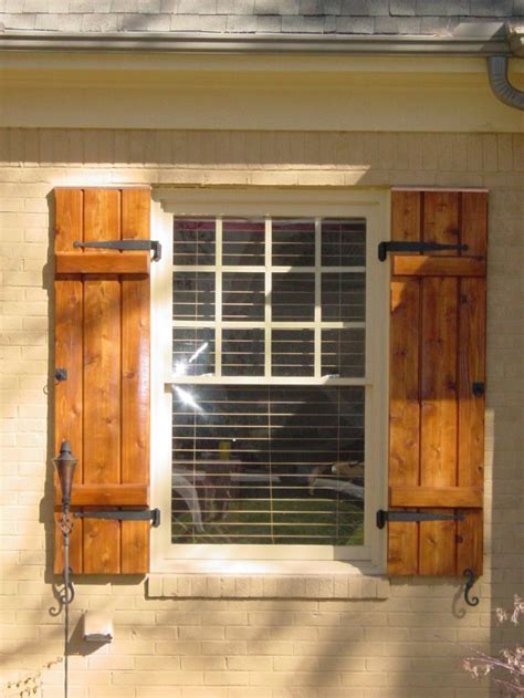 Estate millwork's house shutters are elegant additions to the exterior of any house; Stylish wood shutters for privacy and elegance - CareHomeDecor
