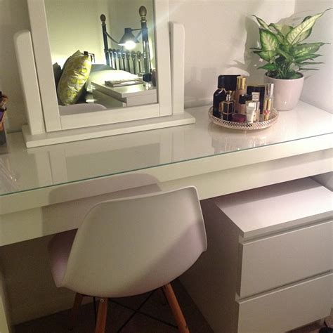 A problem with adjustable beds is to reach anything placed on a bedside table so a solution was to make an extendable table built from a malm drawer. Ikea Malm dressing table...I'll just buy this vanity and ...
