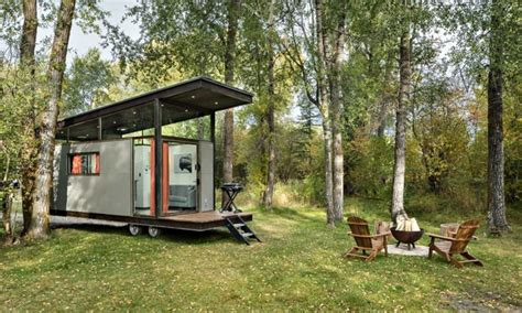 Tiny House With High Ceiling Surrounded By Glass Living In A Tiny