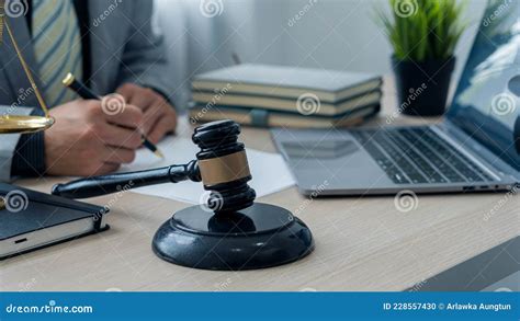 Attorney S Office Judge With Hammer And Scales With Laptop On Desk