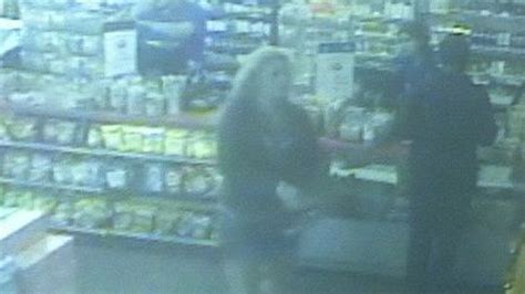Surveillance Video Shows Woman Accused Of Impersonating A Police Officer