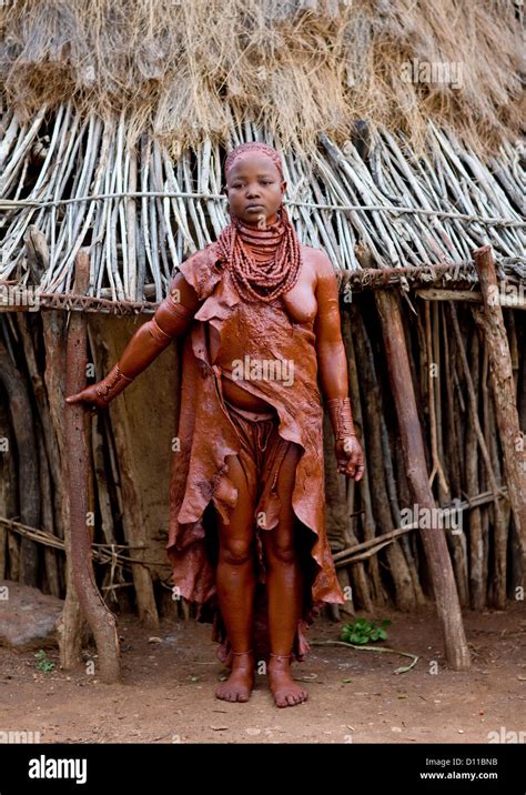 Portrait Of A Uta Hamar Tribe Woman Covered With Red Clay Posing