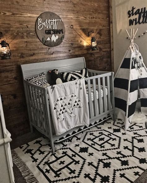 They're more practical than you might believe. Wood wall, Black & white nursery decor, shiplap, monochrome nursery, woodland, rustic, baby boy ...