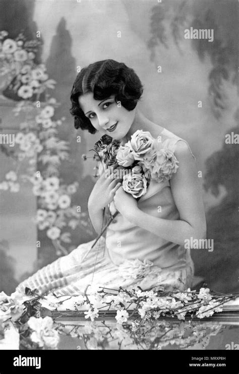 Woman With Flowers 1920s Germany Stock Photo Alamy