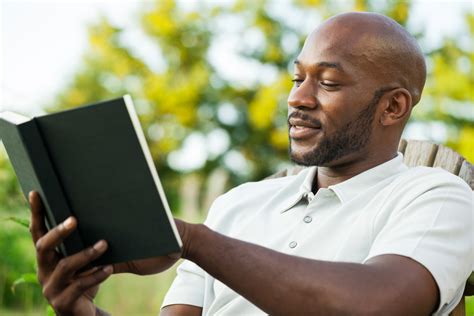 Handsome Black Man Reading Book At Park Jay Harold