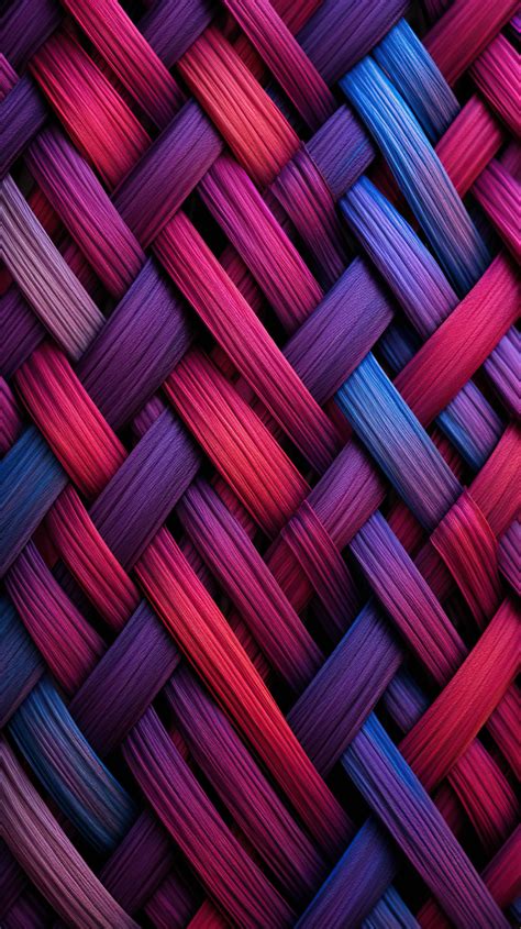 The tight weave of fabric threads, their intersecting lines creating an