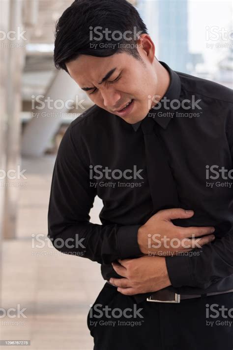 Man Suffering From Stomach Ache Diarrhea Constipation Acid Reflux