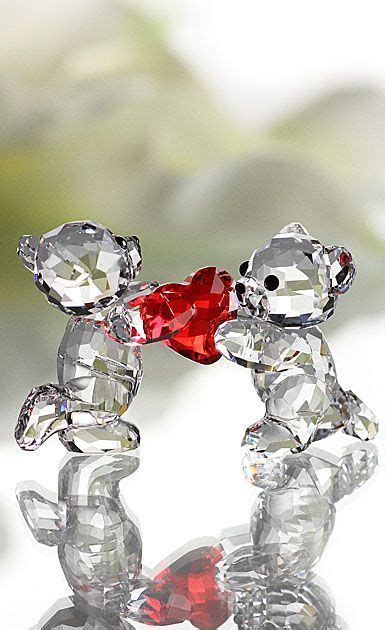 Two Teddy Bears With Red And Clear Hearts