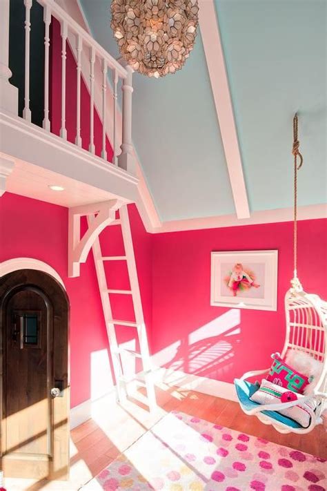 Stylish Pink And Blue Girls Bedroom Is Illuminated By A Capiz