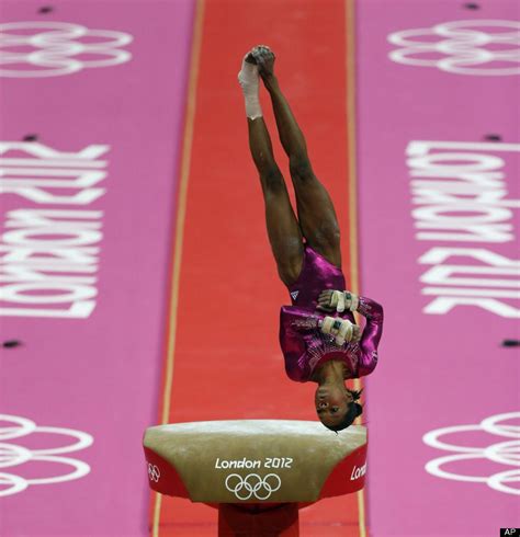 Gabrielle Douglas Us Gymnast Gabrielle Douglas Performs On The Vault During The Artistic