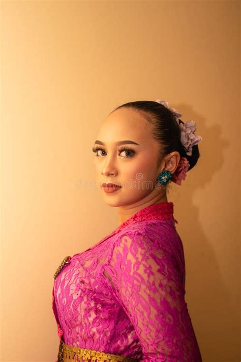 Slim And Asian Women Wearing A Traditional Dress From Indonesia Called Kebaya Stock Image