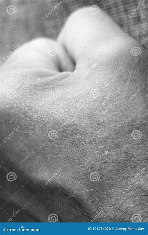The Man In Anger Clenched His Fists On The Table Stock Photo Image