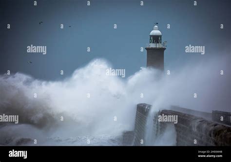 Giant Waves Batter The Lighthouse And North Pier Guarding The Mouth Of