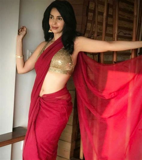 Mallika Sherawat Hot Images In Maroon Saree